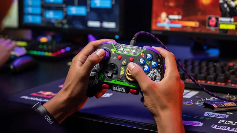 Close-up of competitive player hands adjusting a tournament controller